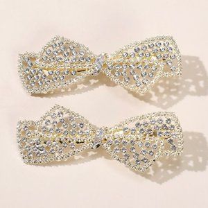 Two piece rhinestone bow hair clips. New.